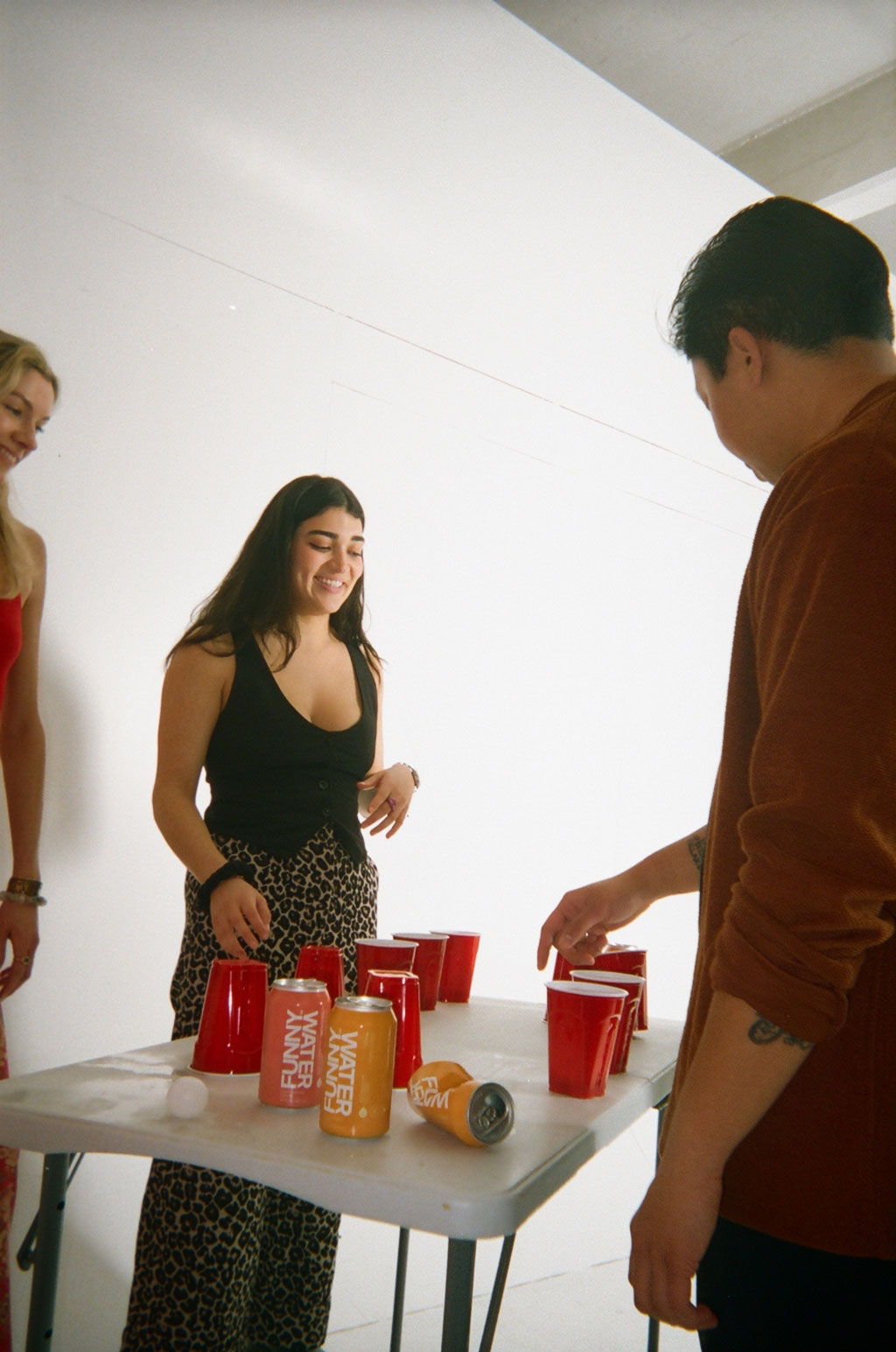 People playing a drinking game